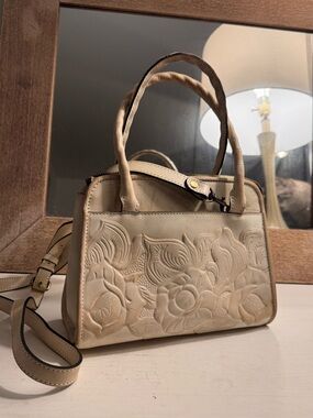 Used Cream Tooled Patricia Nash handbag with dust bag.
